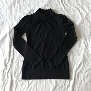 Black turtleneck long sleeve top